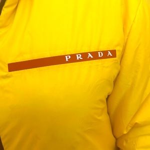 Large PRADA yellow Windbreaker, gently used. Excellent condition.